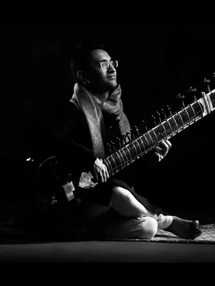 A contemplative black and white photo from a studio session, capturing the introspective nature of my music.