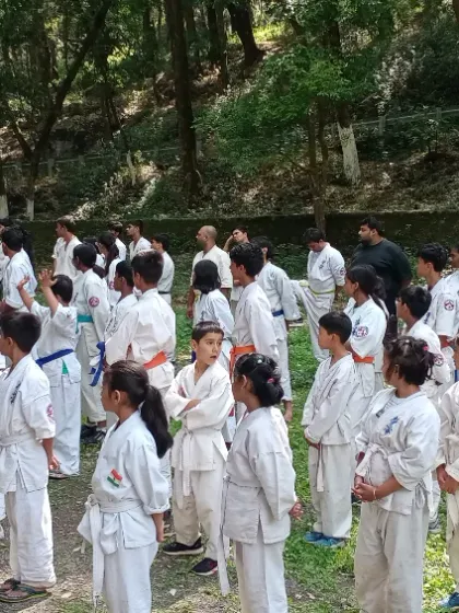 A wide shot of the students assembled for training. The unity and collective focus of the group is always impressive to see.
