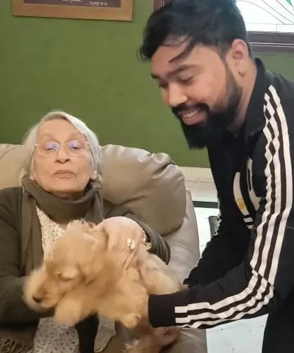 It brings me great joy to help people of all ages find a furry companion. Here I am delivering a gentle puppy to a new owner, ensuring a smooth and happy transition for both.