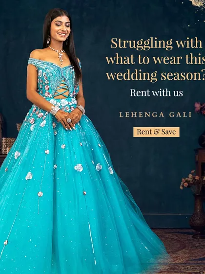 For your fairy tale moment, we have the perfect gown. This breathtaking, off-the-shoulder blue gown with delicate floral appliqué is designed to make you feel like royalty, and it's available to rent for your reception or special event.