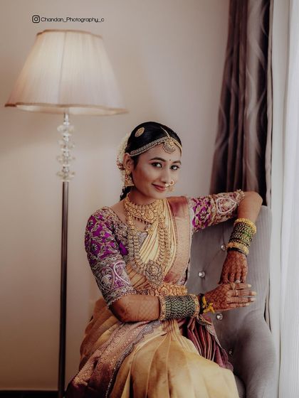 It was a joy to bring Jahnvi's dream engagement attire to life. I paired her beautiful Kanchipuram saree with a custom blouse featuring intricate handwork on the sleeves and added a flowing veil for a princess-like charm.