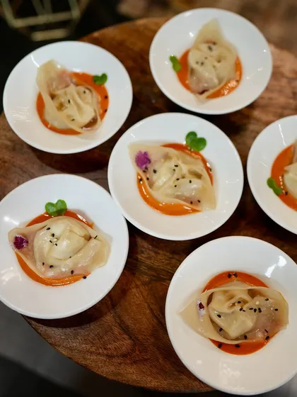 Delicate tortellini in a red pepper coulis, served at the Casa Mia event. Our food became part of the visual story of refined design.