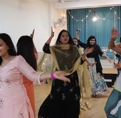 Students enjoying a festive dance session during our Diwali event. Everyone is dressed in beautiful traditional attire, adding to the celebratory atmosphere of the festival of lights.