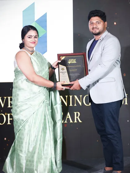 We are honored to be recognized for our work. This moment captures us receiving the "Creative Designing Firm of the Year" award, a testament to our team's dedication to pushing the boundaries of design and construction in Bangalore.