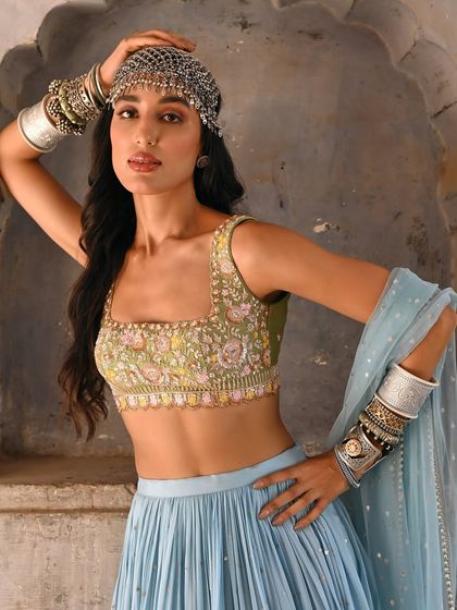 This extensive collection features a wide array of modern festive attire. From vibrant sharara sets and elegant anarkalis to chic jumpsuits and light lehengas, these pieces are curated for wedding guests and anyone looking for a stylish outfit for a special occasion.