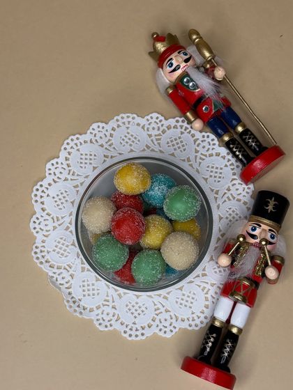 My colorful Cashew Marzipan treats, guarded by a couple of festive nutcrackers. They come in 150g packets and are a perfect little gift or stocking stuffer.