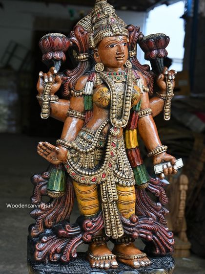 A full view of the 47-inch standing Lakshmi statue, showing her complete form and colorful attire.