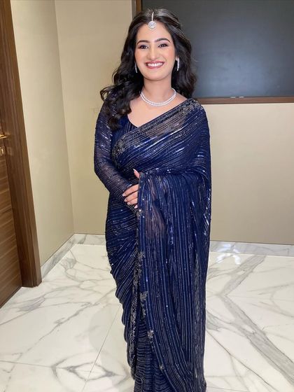 The complete look for Saloni's engagement. The soft waves and minimal makeup let her and the gorgeous saree do all the talking.