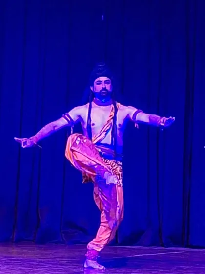Another powerful stance from a solo Chhau recital. The body language here communicates both strength and devotion, capturing the dual essence of this unique martial dance form.