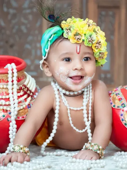Our special Janmashtami mini sessions are a favorite. We provide the complete 'Little Krishna' outfit and set to create these adorable, festive memories.