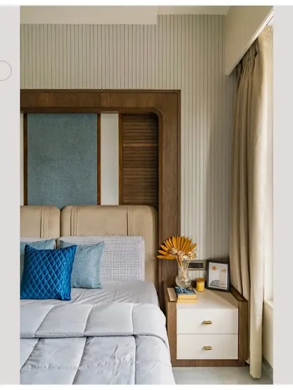 A shot of the bed backdrop, a key feature that gives the bedroom its unique character.