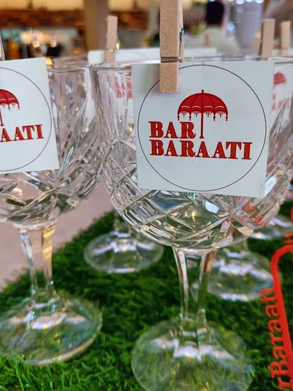 To ensure no one loses their drink, I provide custom glass tags. These simple, branded tags are clipped onto elegant crystal glasses, combining practicality with a touch of personalized decor.