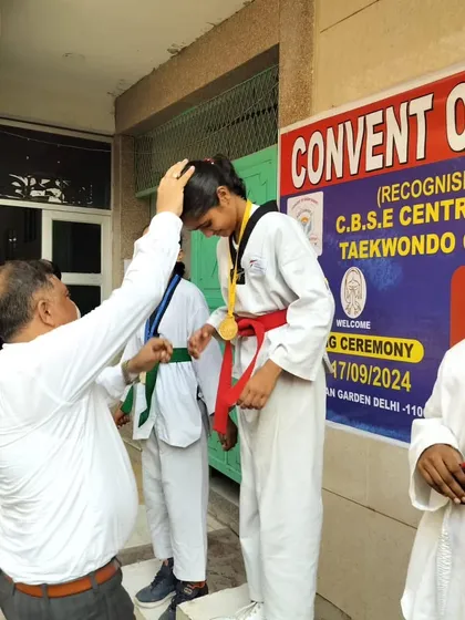 A student receiving her gold medal at the CBSE Central Zone Championship, a qualifying event for the nationals.