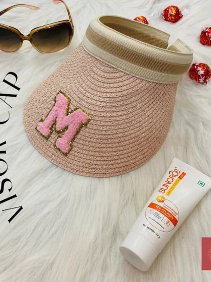 Our stylish personalized visor cap, perfect for sunny holidays, girls' trips, or as a chic bridesmaid gift. This woven visor features a custom initial patch for that personal touch.