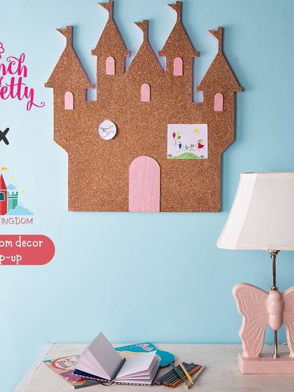 A duplicate of the castle-shaped cork board from Pinch of Pretty.