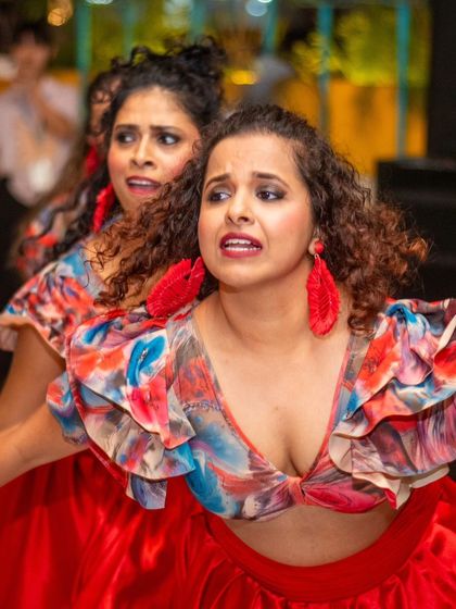 The intensity of performance captured up close. This shot shows the focus and emotion required to connect with the audience and deliver a memorable show.