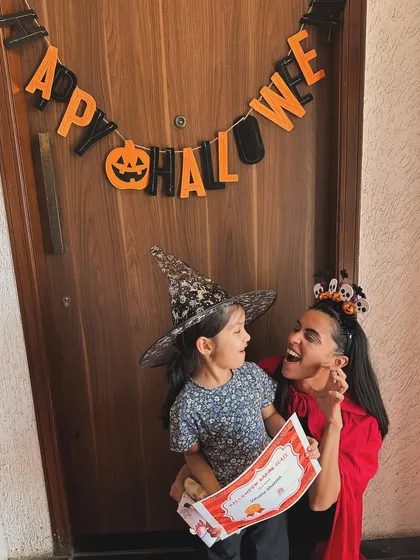 That look of pure joy and accomplishment. This little witch is so proud to receive her certificate after our Halloween baking workshop.