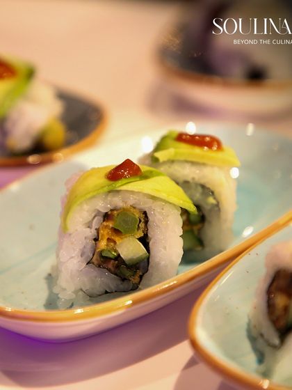 Perfectly crafted avocado sushi rolls, showcasing our expertise in Japanese cuisine. We use fresh ingredients to create authentic and delicious global dishes.