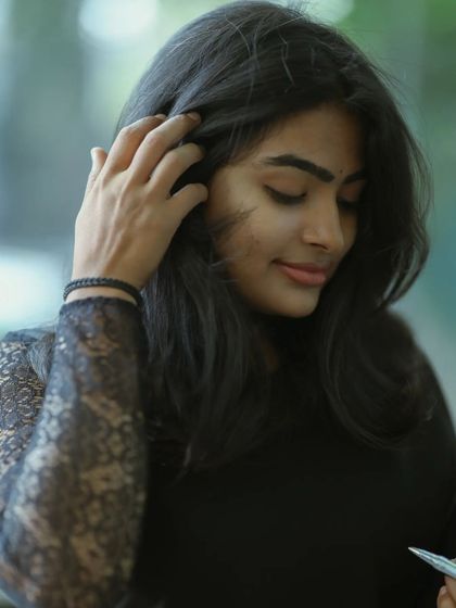 A candid moment captured during a shoot. My goal is to make you feel so comfortable that your natural beauty and personality shine through.