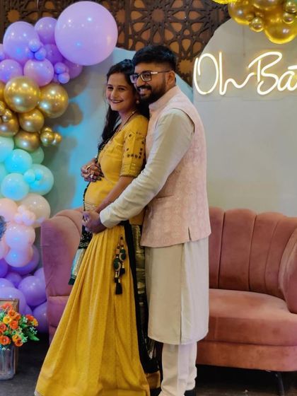 Happy clients enjoying the beautiful backdrop I created for their baby shower. Seeing these smiles is why I love my job of turning dreams into reality.