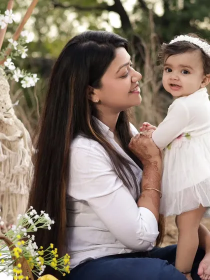 A tender moment between a mother and her baby girl during an outdoor boho-themed shoot. These are the heartfelt memories we love to create.