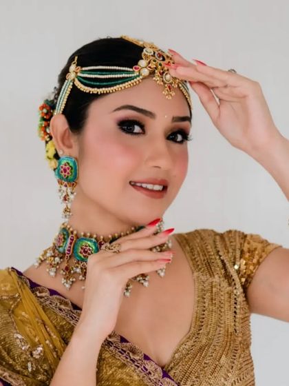 Signature Floral Buns & Updos photo 18