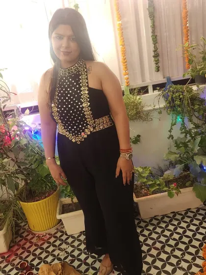 A full view of the black embellished jumpsuit, a perfect outfit for a Diwali party or any festive get-together.