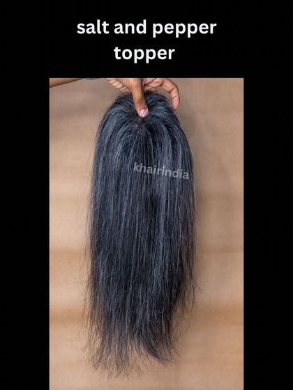Embrace your natural color with our salt and pepper topper. This piece is a 4/5 lace base, offering a lightweight feel and a realistic blend for those with graying hair.