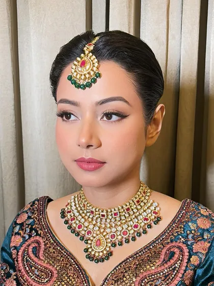 The complete look for Sumiya. The makeup, hair, and outfit all come together to create a stunning and memorable bridal appearance.