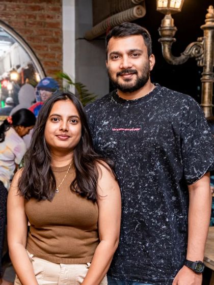 Another shot of this couple enjoying the relaxed rooftop vibe.