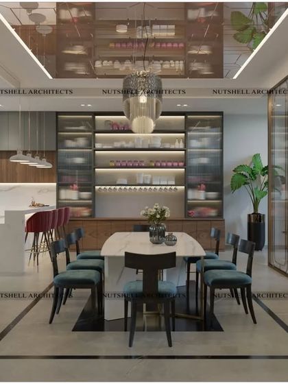 This design connects an open kitchen with the dining area, perfect for modern family living. A large island provides extra counter space, while the mirrored ceiling above the dining table adds a sense of luxury and spaciousness.