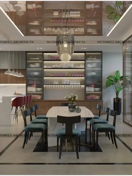 This design connects an open kitchen with the dining area, perfect for modern family living. A large island provides extra counter space, while the mirrored ceiling above the dining table adds a sense of luxury and spaciousness.