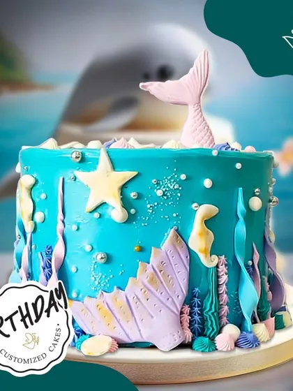An under-the-sea adventure awaits with this mermaid-themed cake. It features a shimmering mermaid tail, starfish, and intricate shell details in shades of ocean blue and purple.