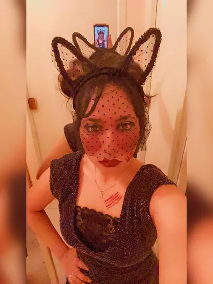 A selfie showing the detailed veil and makeup for my black cat Halloween look.