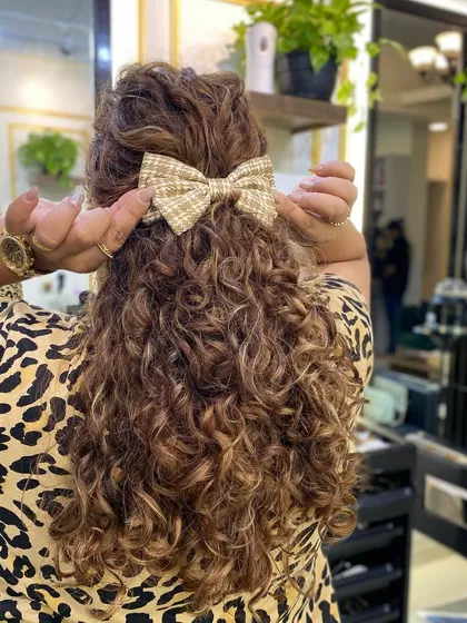 A gallery of my wonderful clients flaunting their unique and beautiful curls. Every curl pattern is different, and I love celebrating them all.