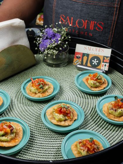 A platter of my fusion Avocado Papri Chaat. I give this classic street food a modern twist by using fresh avocado, creating a refreshing and trendy appetizer for any occasion.