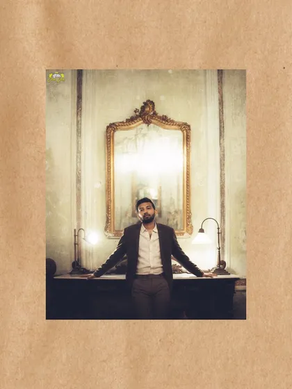 A solo portrait of the groom in the same vintage Pondicherry setting, exuding confidence and classic style.