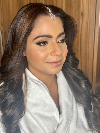 A sneak peek of the wedding day glam. This is the 'getting ready' stage, where we build the foundation for a surreal and luminous final look.