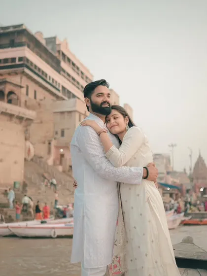 An intimate embrace on a boat along the ghats of Banaras. This image captures the soulful, cultural essence of the holy city, creating a deeply emotional and timeless portrait.