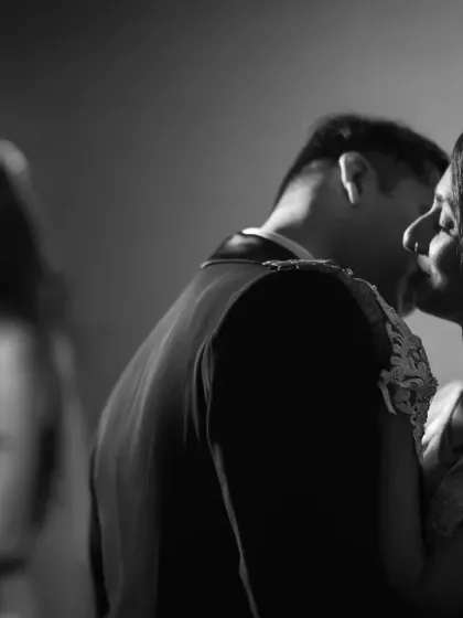 There's something timeless and romantic about a black and white photo. This shot, inspired by classic 1940s films, uses reflections and shadows to create a moody and intimate couple portrait during a monsoon wedding.