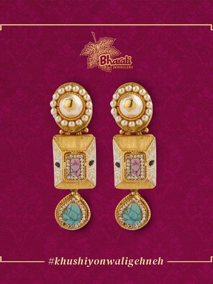 Exquisite beauty in every detail. These stunning earrings feature square-shaped motifs with intricate Meena detailing, pearl accents, and a turquoise-colored drop, all beautifully crafted in gold.
