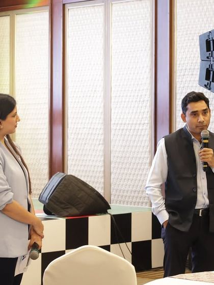 Listening intently as a Cipla team member shares his thoughts. Active listening is a crucial part of my role as a host.