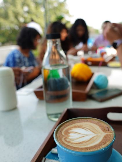 Coffee and crochet, the perfect blend. This picture captures the relaxed and cozy vibe of my workshops.