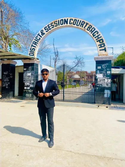 At the entrance of the District & Session Court in Baghpat. My commitment is to the client, no matter the location.