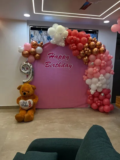 A slightly different angle of the birthday setup, showing how it fits perfectly in a home living room.