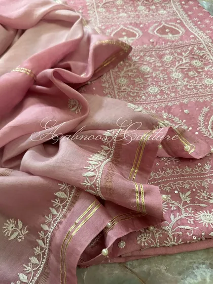 A detail shot of the dupatta's border, featuring gota, sequins, and seed pearls.