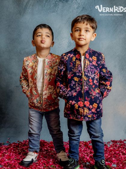 Pout and pose. These two show off their floral bomber jackets, a favorite from our Jashn collection that’s perfect for weddings, parties, and family functions.