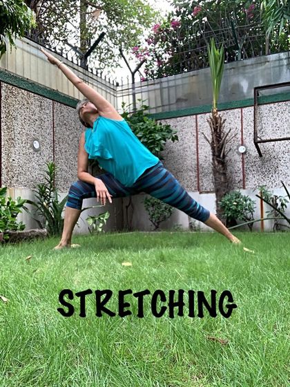 Taking my stretching practice outdoors. The fresh air and connection to the earth enhance the feeling of openness this side stretch provides.
