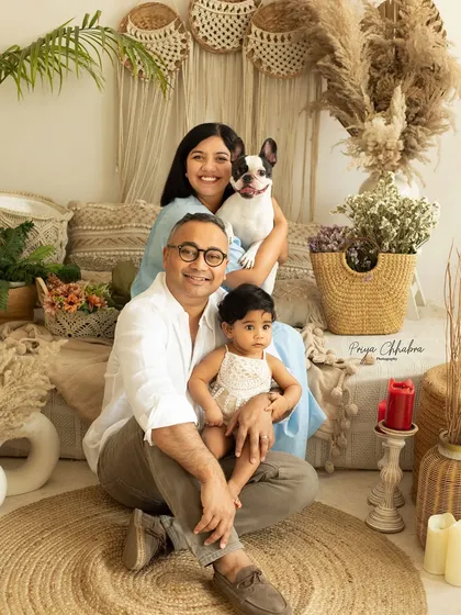 Your furry friends are family, and they are always welcome in my studio. This beautiful family portrait, complete with their adorable French bulldog, shows that the more love in the frame, the better the memory.
