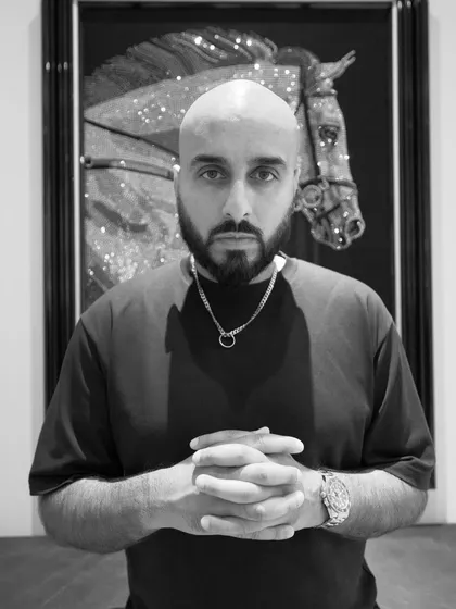 A black and white portrait. Sometimes, stripping away the color lets the emotion and focus shine through.